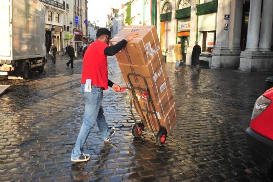 A man carrying Boxes in Brussels